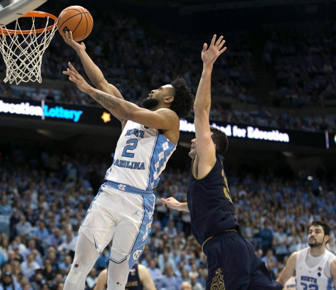 North Carolina’s Joel Berry II (2) drives to the basket against Notre Dame’s John Mooney (33) during the second half on Monday, February 12, 2018 at the Smith Center in Chapel Hill, N.C. Berry scored 21 points in the Tar Heels’ 83-66 victory.