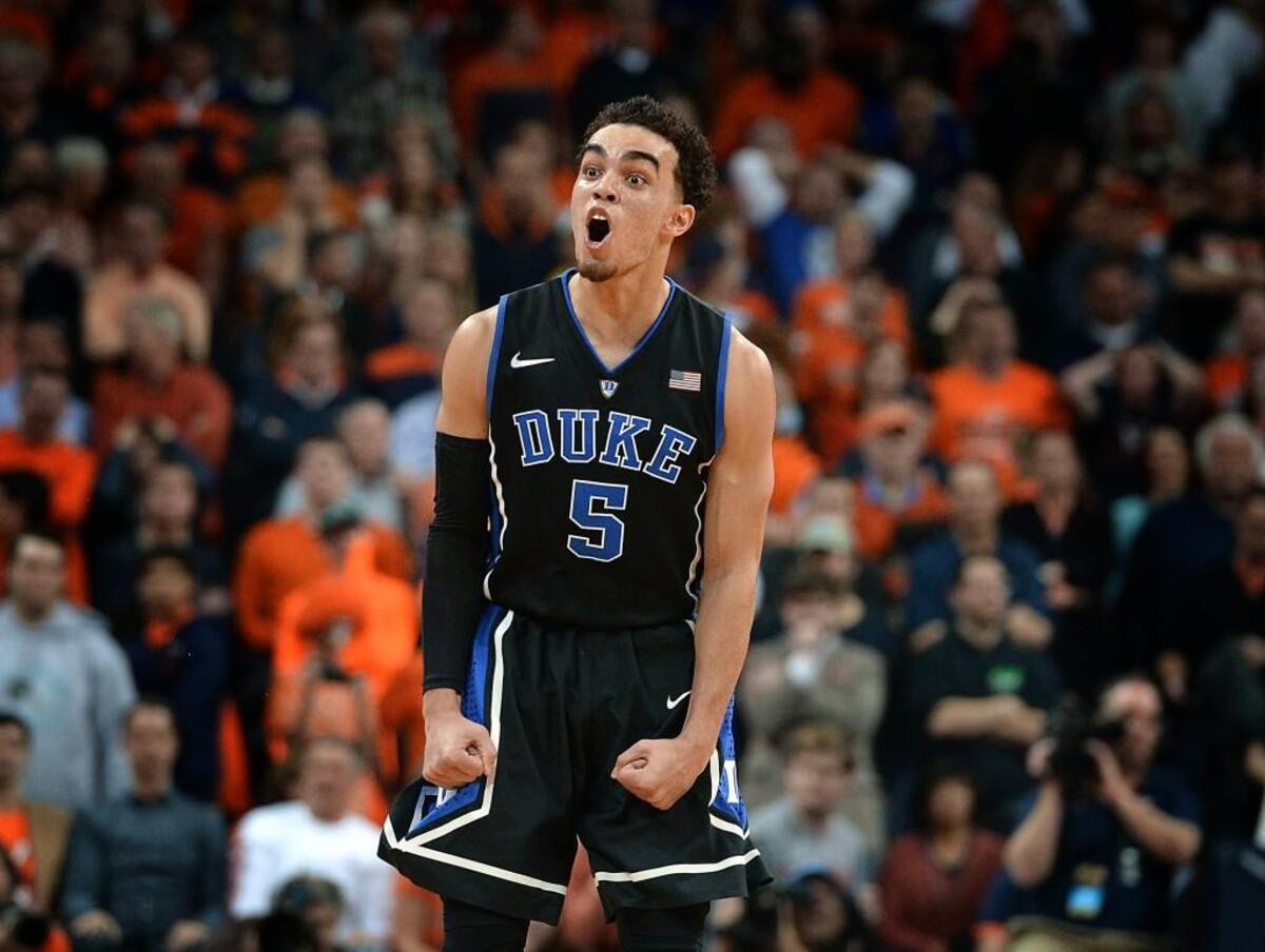 Duke guard Tyus Jones (5) reacts after hitting a three pointer that put the game away as Duke upset undefeated Virginia 69-63 at John Paul Jones Arena at the University of Virginia in Charlottesville, Va Saturday, January 31, 2015.