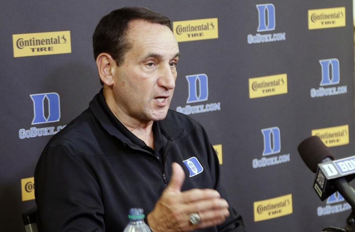 Duke coach Mike Krzyzewski talks to the media about the upcoming season and the recent scandal in college basketball during a press conference in October.