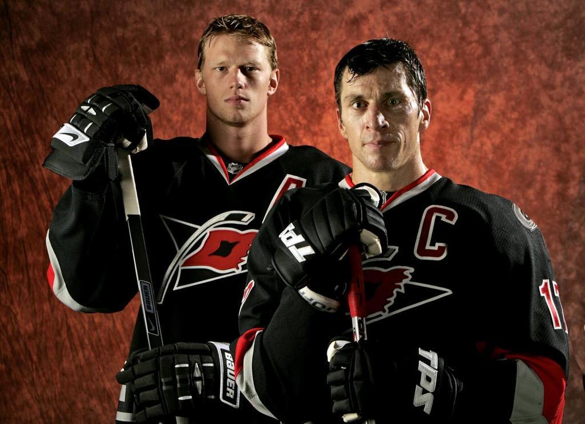 Eric Staal, left, and Rod Brind’Amour spent time as Hurricanes captains. The team has not named a captain for this season. staff/Chris Seward