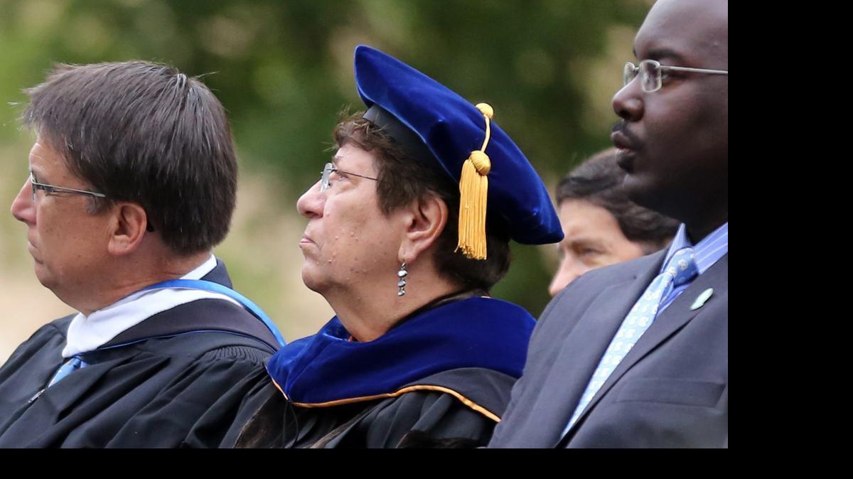 
Jan Boxill (center) listens to new UNC Chancellor Carol Folt's remarks during Folt's installation ceremony in October of 2013. 
