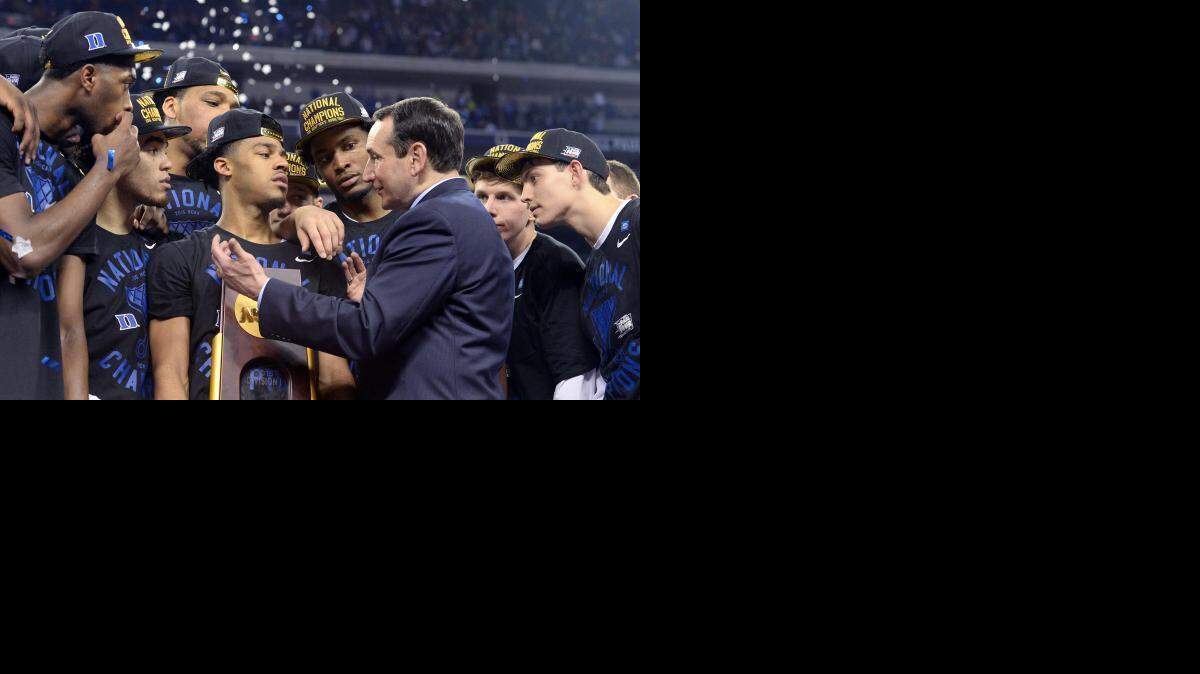 
Dukecoach Mike Krzyzewski talks with his team after the Blue Devils’ 68-63 victory over Wisconsin in the 2015 Division I Men's Basketball Championship game at Lucas Oil Stadium in Indianapolis,.
