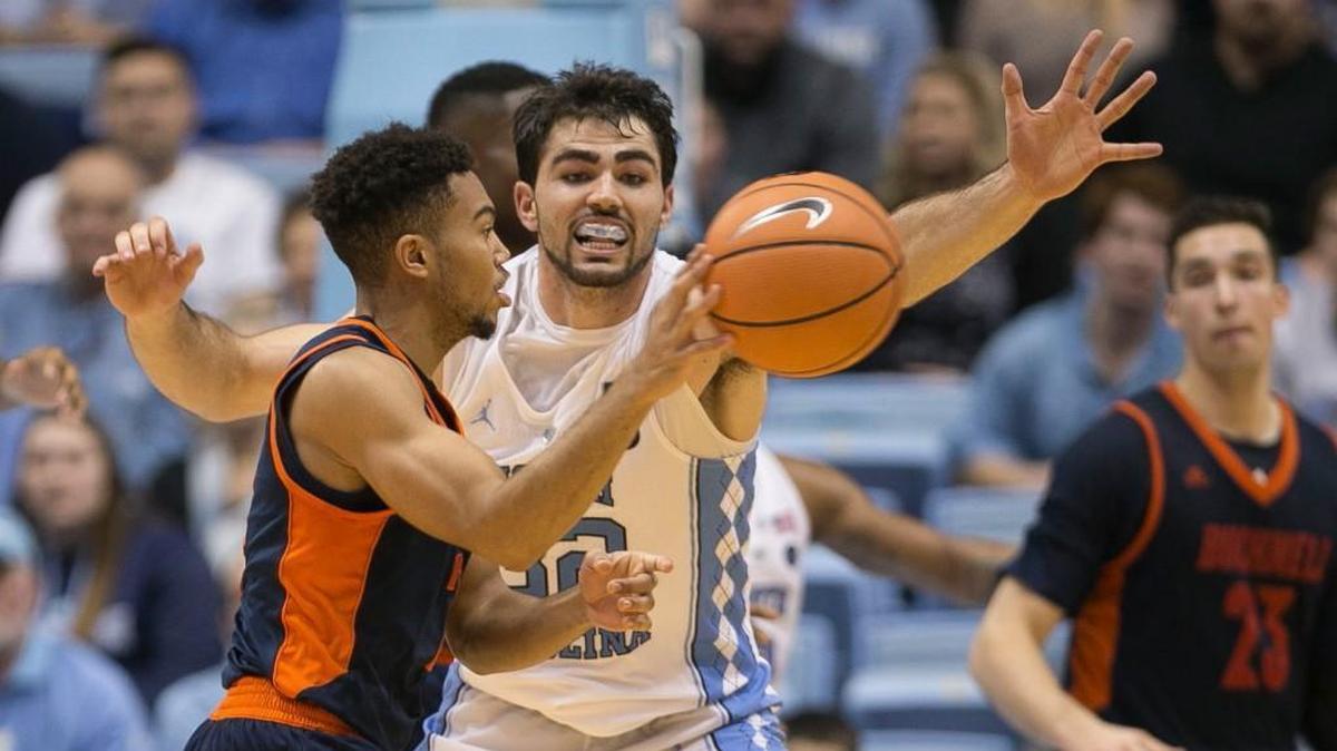 North Carolina’s Luke Maye (32) defends Bucknell’s Stephen Brown (2) during the second half on Wednesday, November 15, 2017 at the Smith Center in Chapel Hill, N.C. Maye lead the Tar Heels with 20 points in their 93-81 victory.