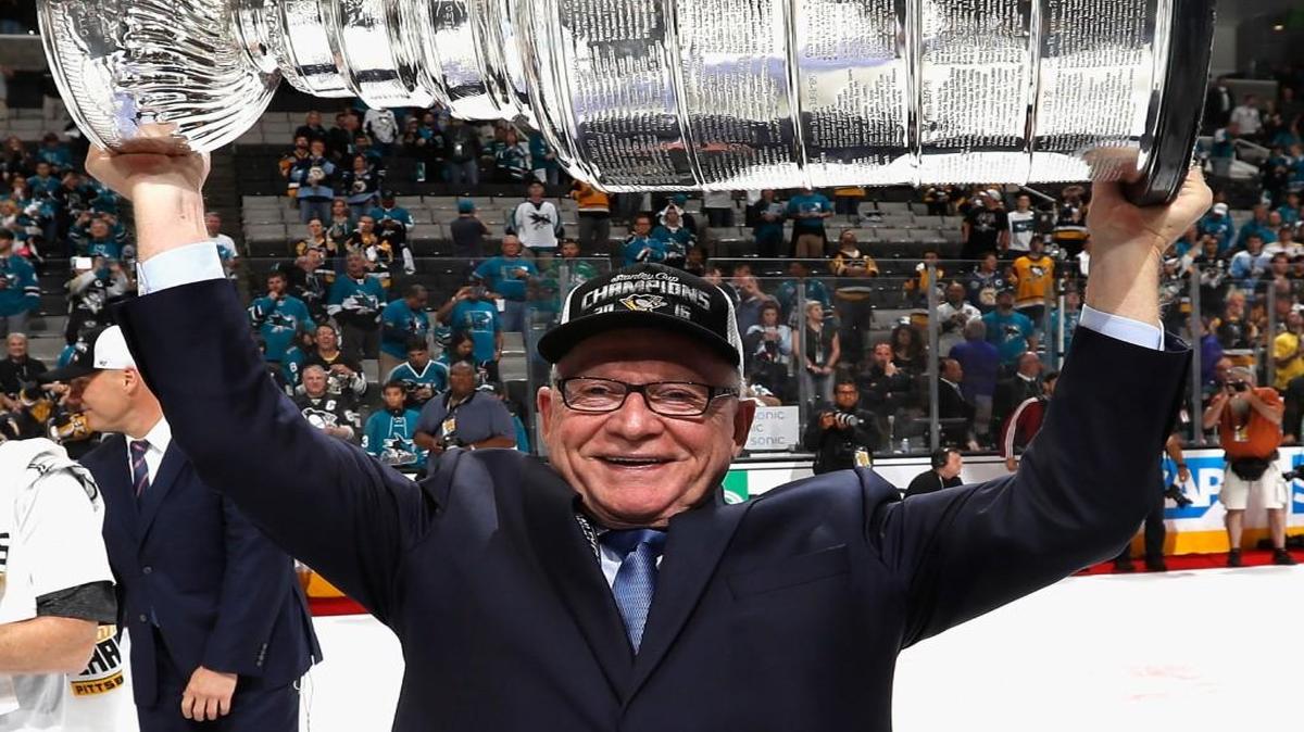 General manager Jim Rutherford of the Pittsburgh Penguins lifts the Stanley Cup after the Penguins won Game 6 of the 2016 NHL Stanley Cup Final 3-1 over the San Jose Sharks.