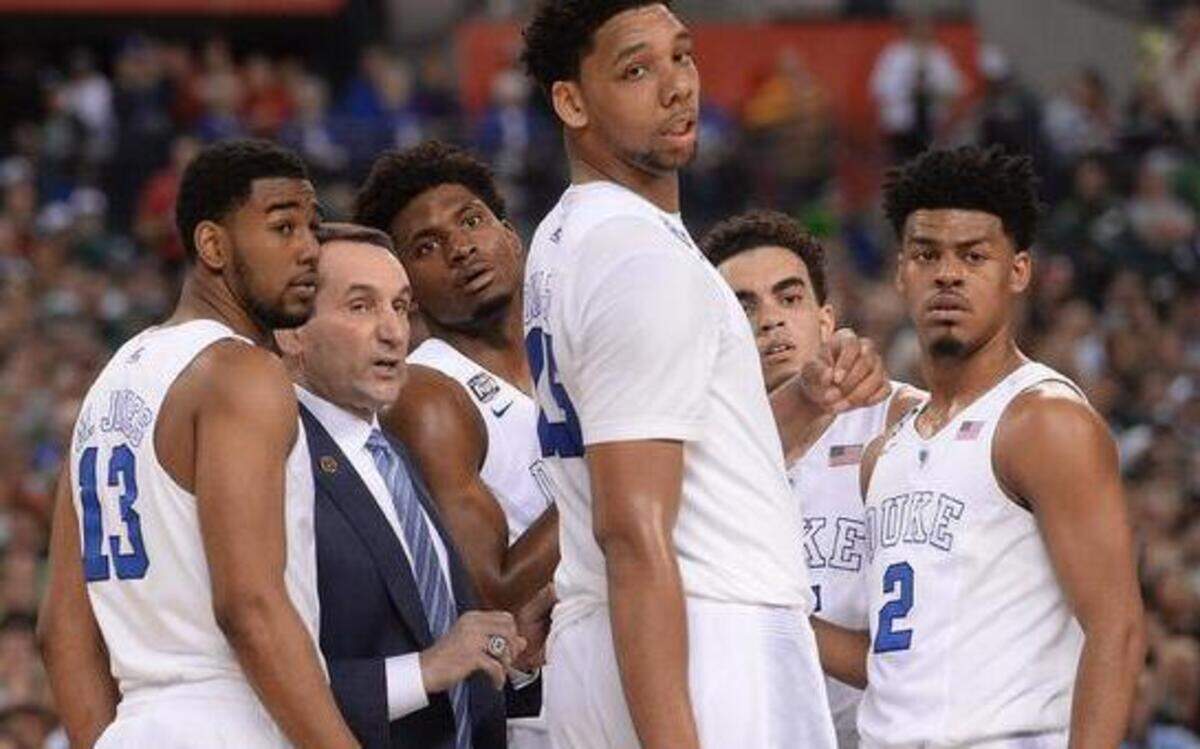 
Duke coach Mike Krzyzewski speaks with his team during a second-half timeout in the game agains Michigan State. From left:Matt Jones (13), Krzyzewski, Justise Winslow, Jahlil Okafor, Tyus Jones and Quinn Cook. 
