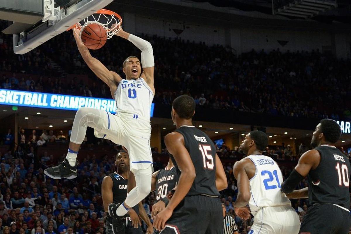Duke forward Jayson Tatum (0) goes in for a first half dunk over South Carolina at the NCAA tournament on March 19, 2017, at the Bon Secours Wellness Arena in Greenville, S.C.