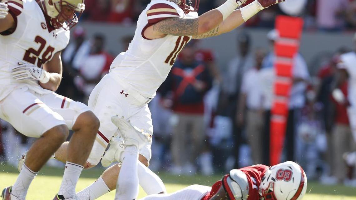 Boston College's Ty Schwab (10) intercepts pass intended for Matt Dayes (21) during Boston College's 21-14 victory over N.C. State at Carter-Finley Stadium on Oct. 29.