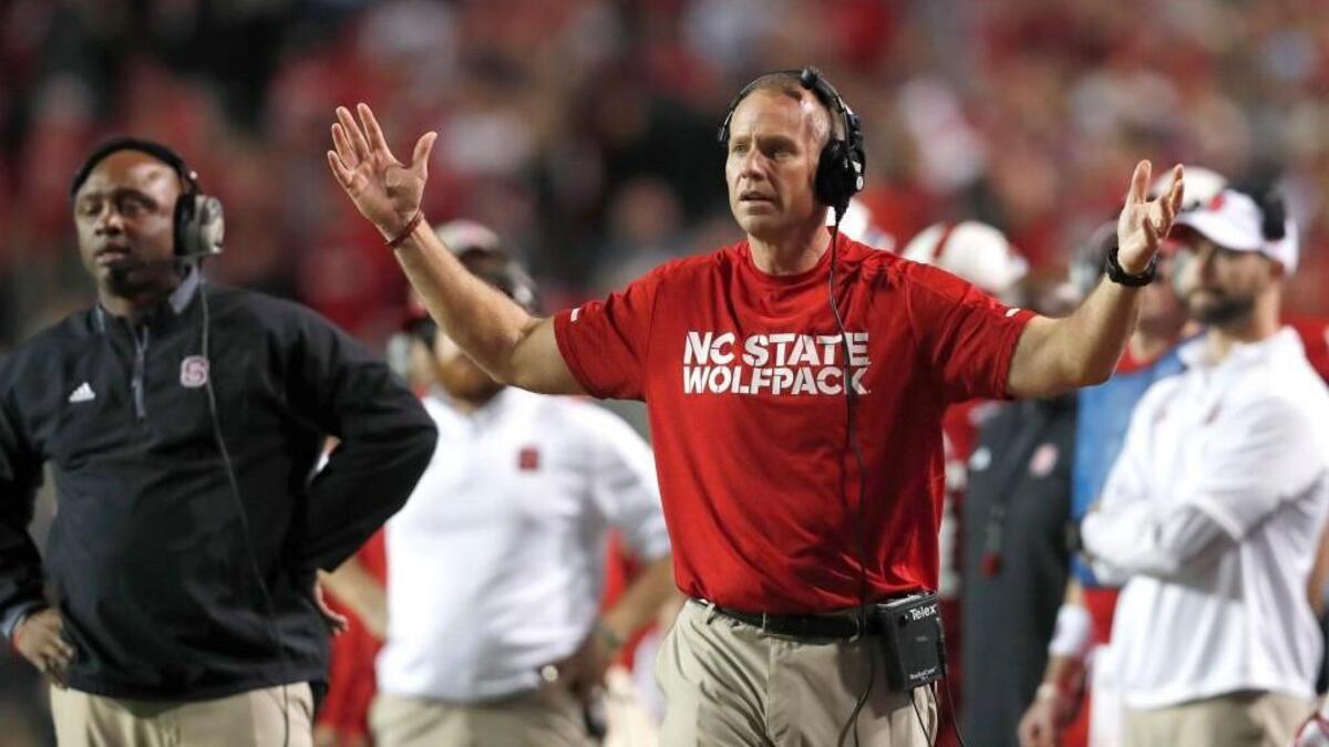 N.C. State head coach Dave Doeren is not happy with the call during the second half of N.C. State's 33-21 victory over UNC at Carter-Finley Stadium on Saturday, Nov. 25, 2017.