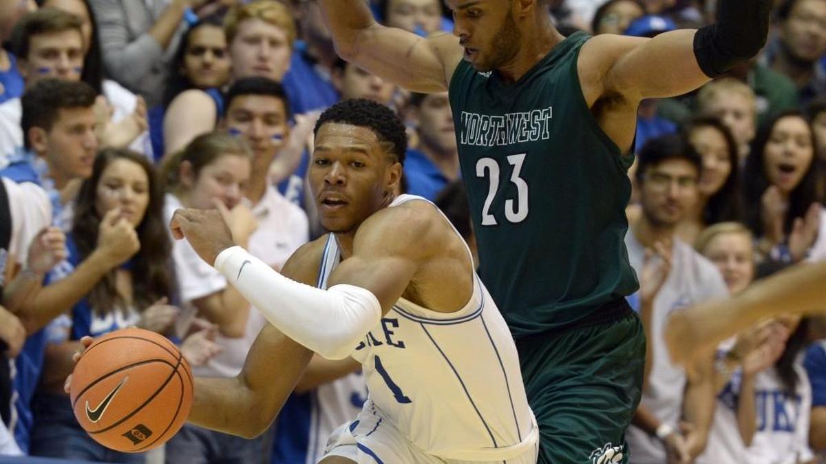 Duke's Trevon Duval (1) moves the ball against Northwest Missouri State Chris-Ebou Ndow (23) in the second half of play. Duke beat Northwest Missouri State 93-60 in an exhibition game at Cameron Indoor Stadium in Durham, N.C. Friday, October 27, 2017.