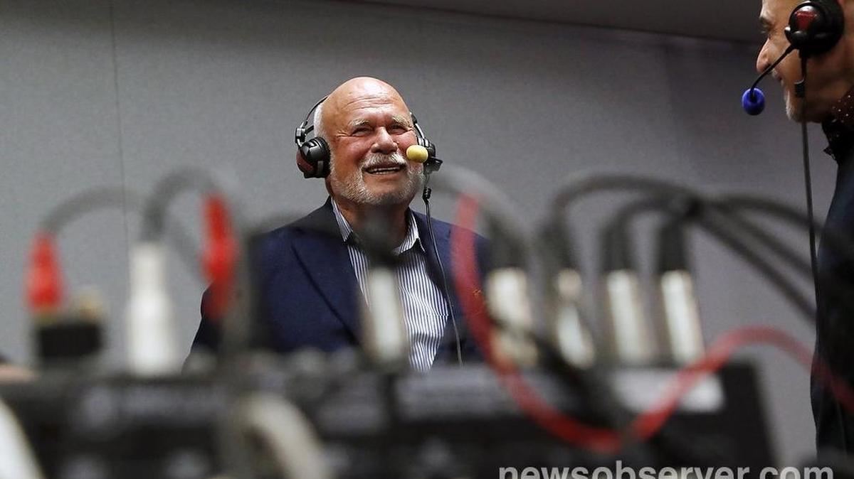 Former majority owner Peter Karmanos smiles during a radio interview at the conclusion of the press conference.