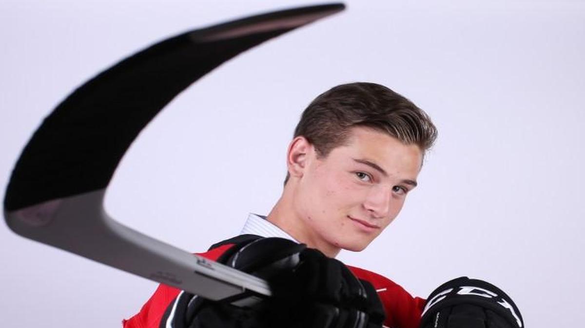Julien Gauthier poses for a portrait after being selected 21st overall by the Carolina Hurricanes in round one during the 2016 NHL Draft on June 24.