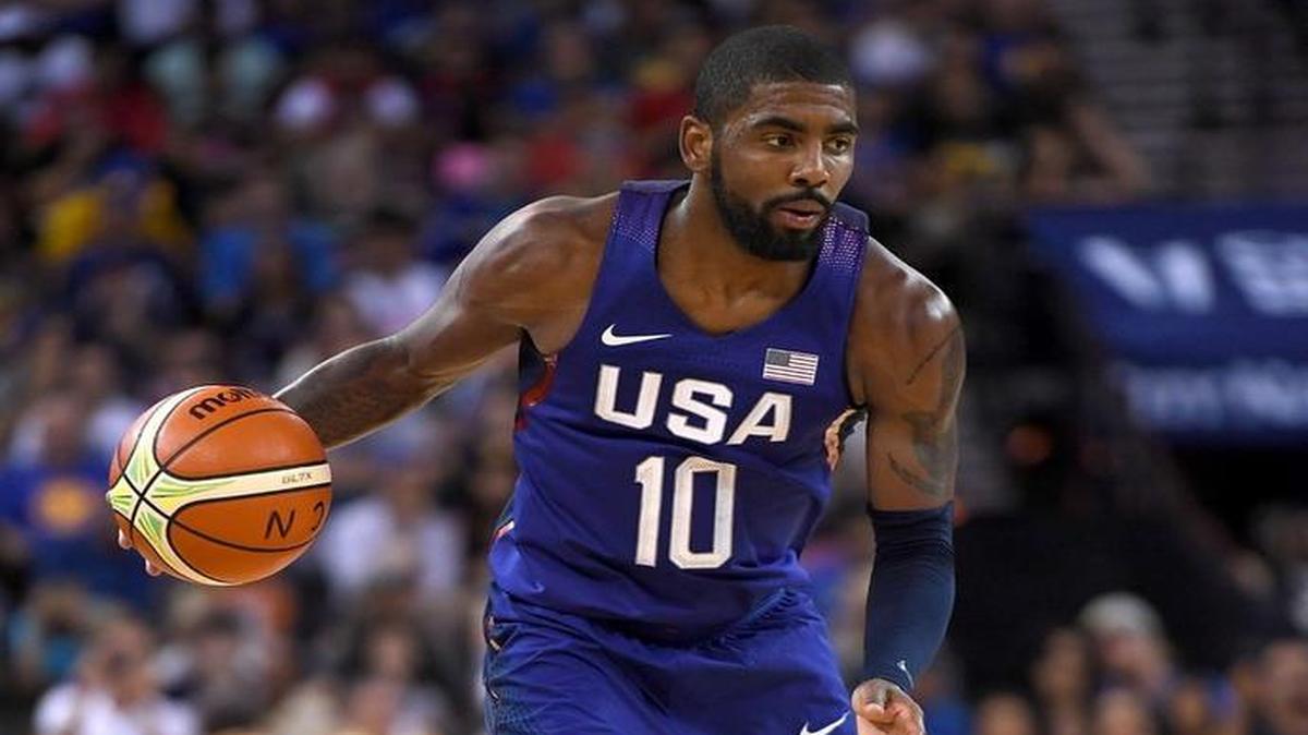 Kyrie Irving #10 of the United States Men's National Team dribbles the ball against the China Men's National Team during the first half of a USA Basketball showcase exhibition game at ORACLE Arena on July 26 in Oakland, California. (Photo by Thearon W. Henderson/Getty Images)