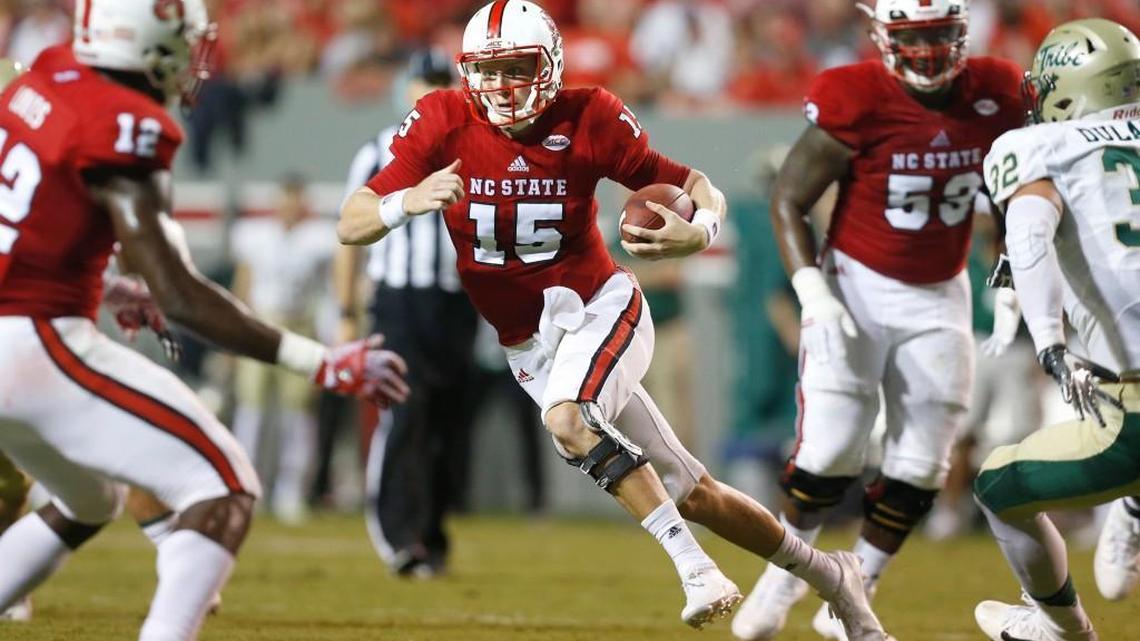 N.C. State quarterback Ryan Finley, middle, scrambles during Wolfpack’s game against William & Mary on Sept. 1. ACC athletic directors will vote at their fall meeting, set for Oct. 5-6, on one of two types of schedules.