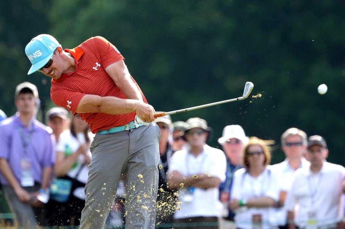 Hunter Mahan tees off on the ninth hole during the third round of the U.S. Open golf tournament at Merion Golf Club, Saturday, June 15, 2013, in Ardmore, Pa.
