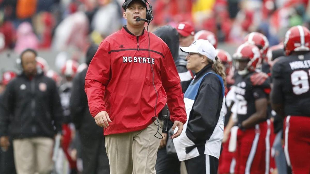 N.C. State head coach Dave Doeren walks the sidelines during the second half of Louisville's 20-13 victory over N.C. State at Carter-Finley Stadium on Oct. 3.
