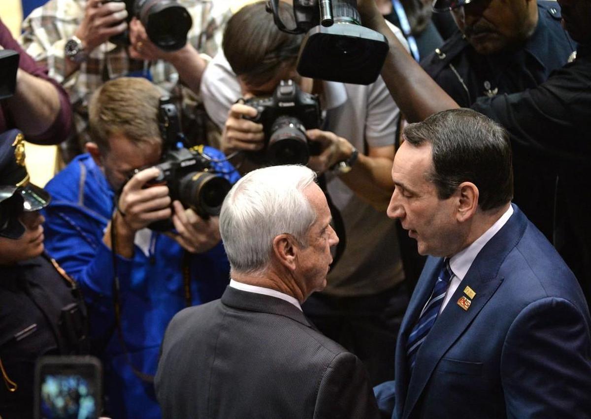 Duke head coach Mike Krzyzewski and UNC head coach Roy Williams greet each other prior to the start of the game. Duke defeated UNC 86-78 at Cameron Indoor Stadium in Durham, N.C. Thursday, Feb. 9, 2017.