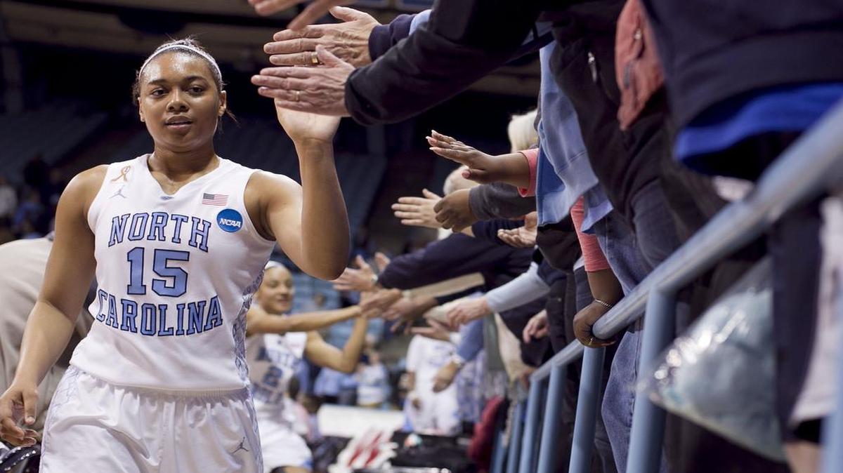
UNC's Allisha Gray (15) celebrates the Tar Heels' 62-53 victory over Michigan State with fans on March 25, 2014, in Chapel Hill. Gray, the leading scorer on the women’s basketball team last season, has received permission to explore a transfer.
