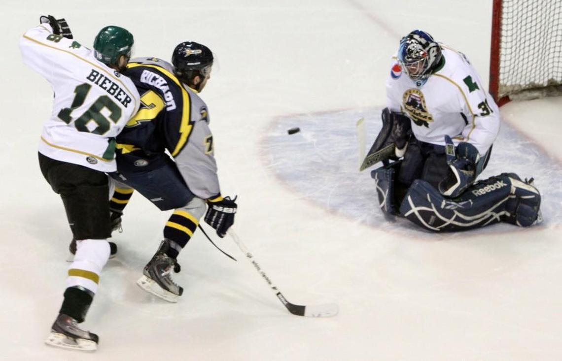 Scott Darling, playing for the SPHL’s Louisiana, blocks a shot by Mississippi right wing Michael Richard.