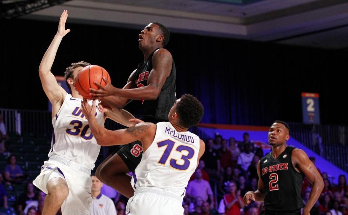 North Carolina State forward Lavar Batts, Jr. (3) drives to the basket as Northern Iowa's Spencer Haldeman (30) and Juwan McCloud (13).