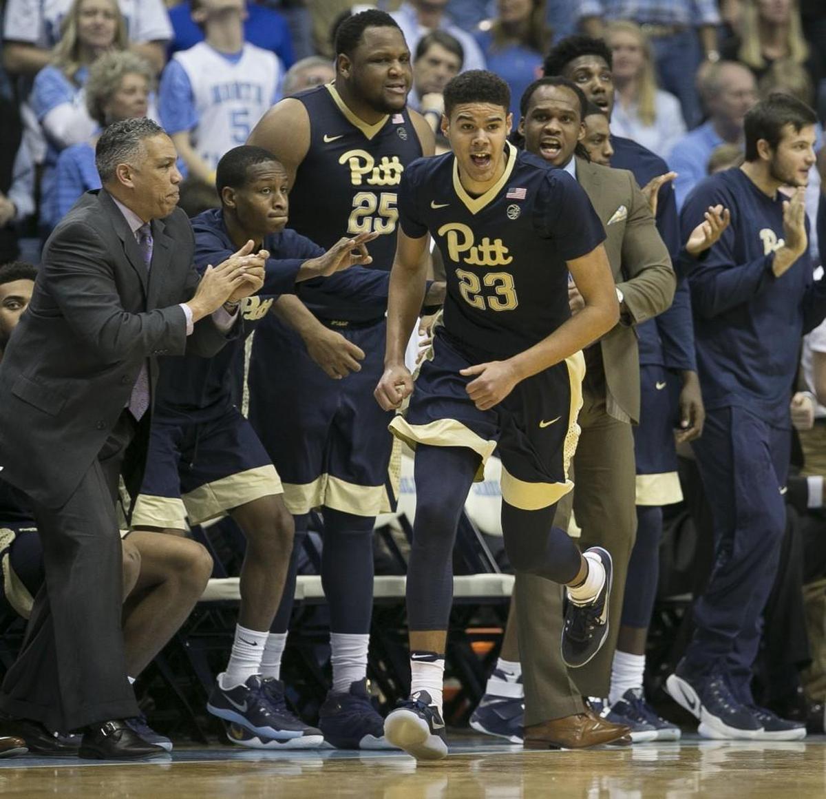 Pittsburgh’s Cameron Johnson (23) reacts in front of his bench after sinking a 3-point basket in the second half against UNC on Jan. 31, 2017 at the Smith Center.