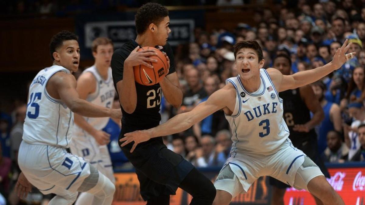 Duke guard Grayson Allen (3) challenges Pittsburgh guard Cameron Johnson (23). Duke beat Pittsburgh 72-64 at Cameron Indoor Stadium on Feb. 4, 2017. Johnson has transferred to UNC.