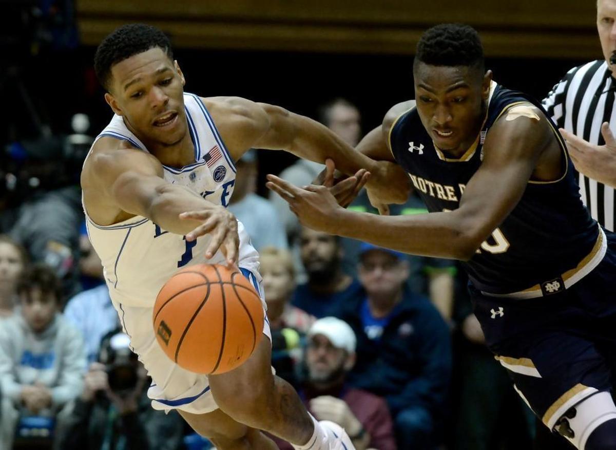 Duke guard Trevon Duval (1) steals the ball from Notre Dame guard TJ Gibbs (10) in the second half. Duke beat Notre Dame 88-66 at Cameron Indoor Stadium In Durham on Monday, Jan. 29, 2018