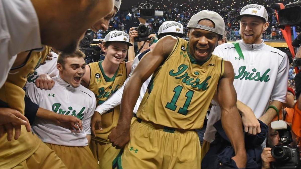 Notre Dame guard Demetrius Jackson (11) dances for teammates after the Fighting Irish defeated North Carolina 90-82 to win their first Atlantic Coast Conference men's basketball tournament championship.