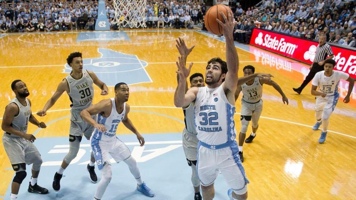 North Carolina’s Luke Maye (32) drives to the basket for two of his game high 17 points against Wake Forest on Saturday, December 30, 2017 at the Smith Center in Chapel Hill, N.C.