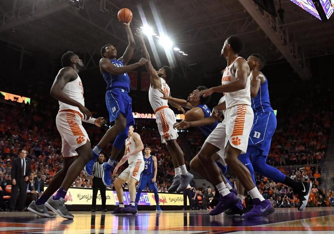 Duke forward Wendell Carter Jr (34) goes up to score in the second half as Clemson guard Gabe DeVoe (10) defends. Duke defeated Clemson 66-57 at Littlejohn Coliseum in Clemson, S.C., Sunday, Feb. 18, 2018.