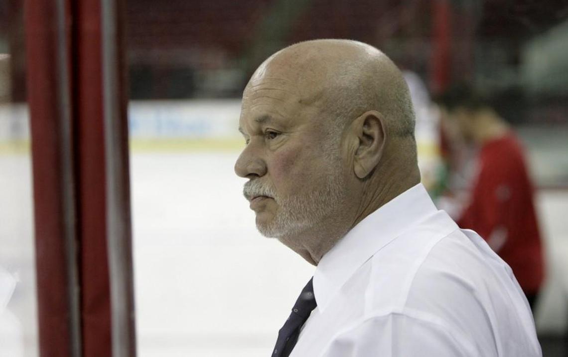 Carolina Hurricanes owner Peter Karmanos watches his team practice in 2009.