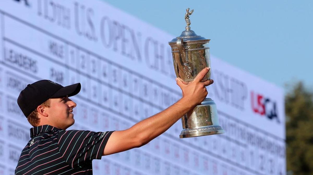 
Jordan Spieth poses with the trophy after winning the U.S. Open on June 21, 2015.
