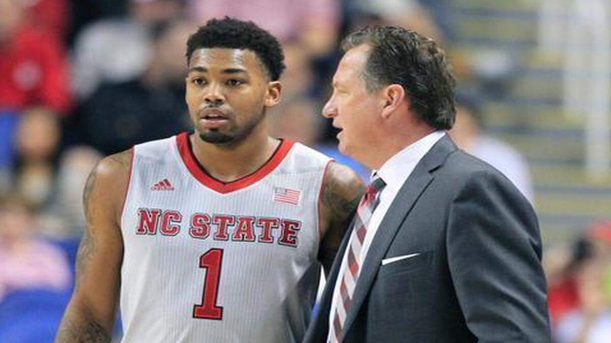
N.C. State’s coach Mark Gottfried talks with Trevor Lacey on Wednesday.


