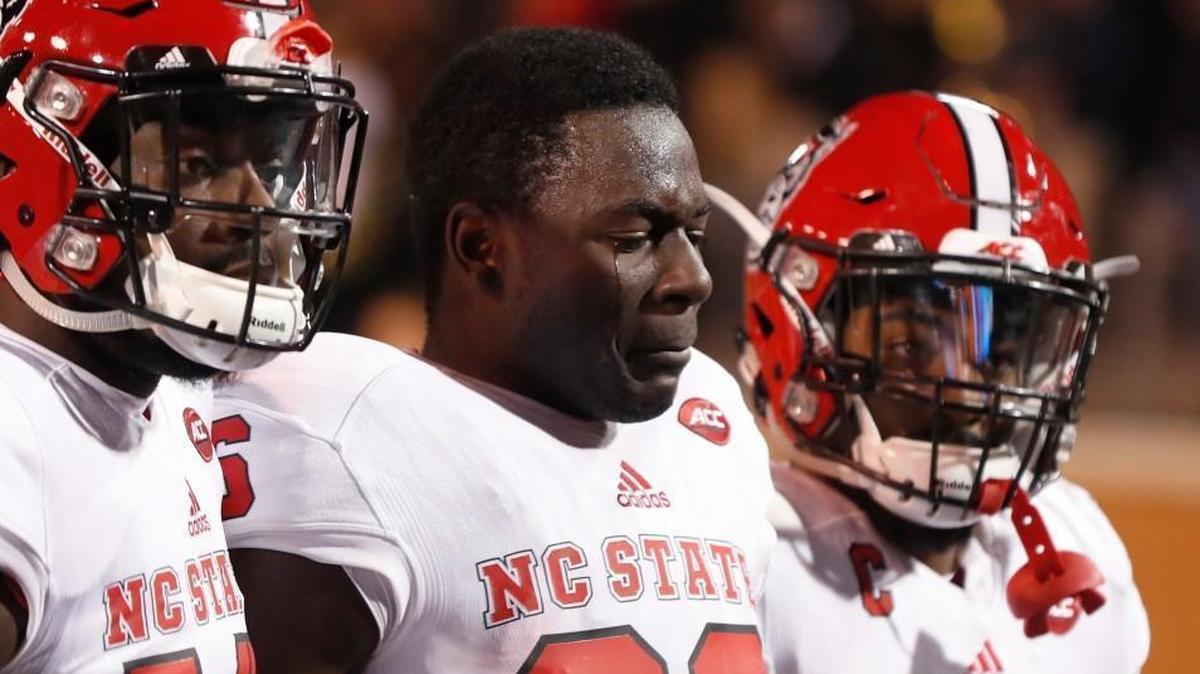 N.C. State’s Emeka Emezie (86) walks off the field in tears after Wake Forest's 30-24 victory at BB&T Field in Winston-Salem, Saturday, Nov. 18, 2017.