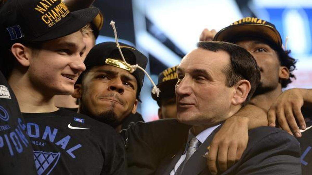 
Duke head coach Mike Krzyzewski, right, talks with Grayson Allen (3), left, after Duke's 68-63 victory over Wisconsin in the 2015 Division I Men's Basketball Championship game at Lucas Oil Stadium in Indianapolis, Ind., Monday, April 6, 2015.
