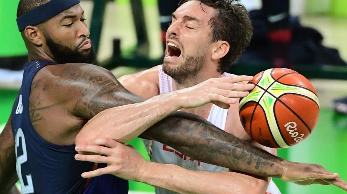 USA's centre DeMarcus Cousins (L) defends against Spain's centre Pau Gasol during a Men's semifinal basketball match between Spain and USA at the Carioca Arena 1 in Rio de Janeiro on August 19, 2016 during the Rio 2016 Olympic Games. / AFP PHOTO / EMMANUEL DUNANDEMMANUEL DUNAND/AFP/Getty Images