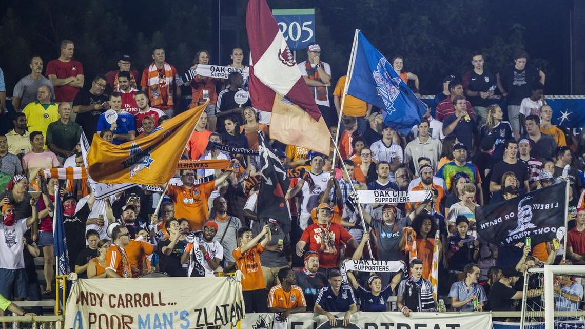 Carolina RailHawks fans cheer after a first half goal as the RailHawks took on West Ham United at the WakeMed Soccer Park in Cary on July 12.