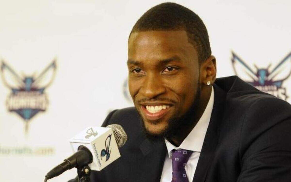 
Charlotte Hornets' Michael Kidd-Gilchrist smiles as he speaks to the media during a press conference announcing a contract extension at Time Warner Cable Arena on Wednesday, August 26, 2015. 
