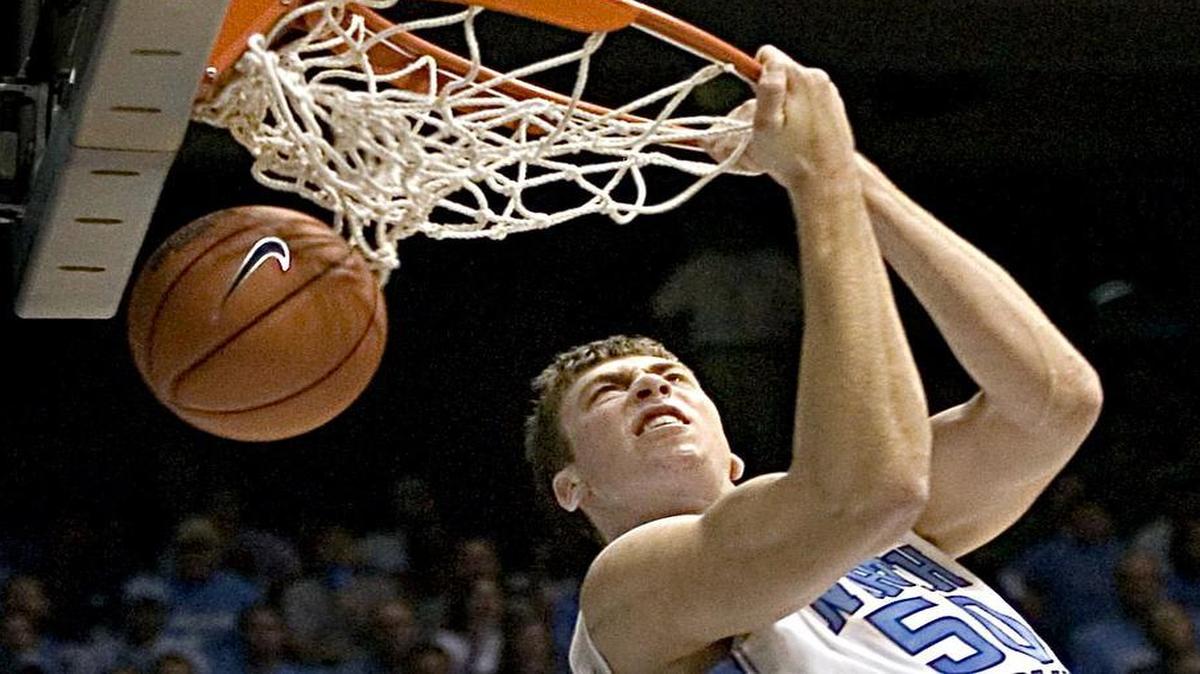 
UNC's Tyler Hansbrough (50) does a reverse dunk after making a steal from St. Augustine's Claude Neeley during the second half of play against St. Augustine's on Wednesday November 1, 2006 in the Smith Center. 
