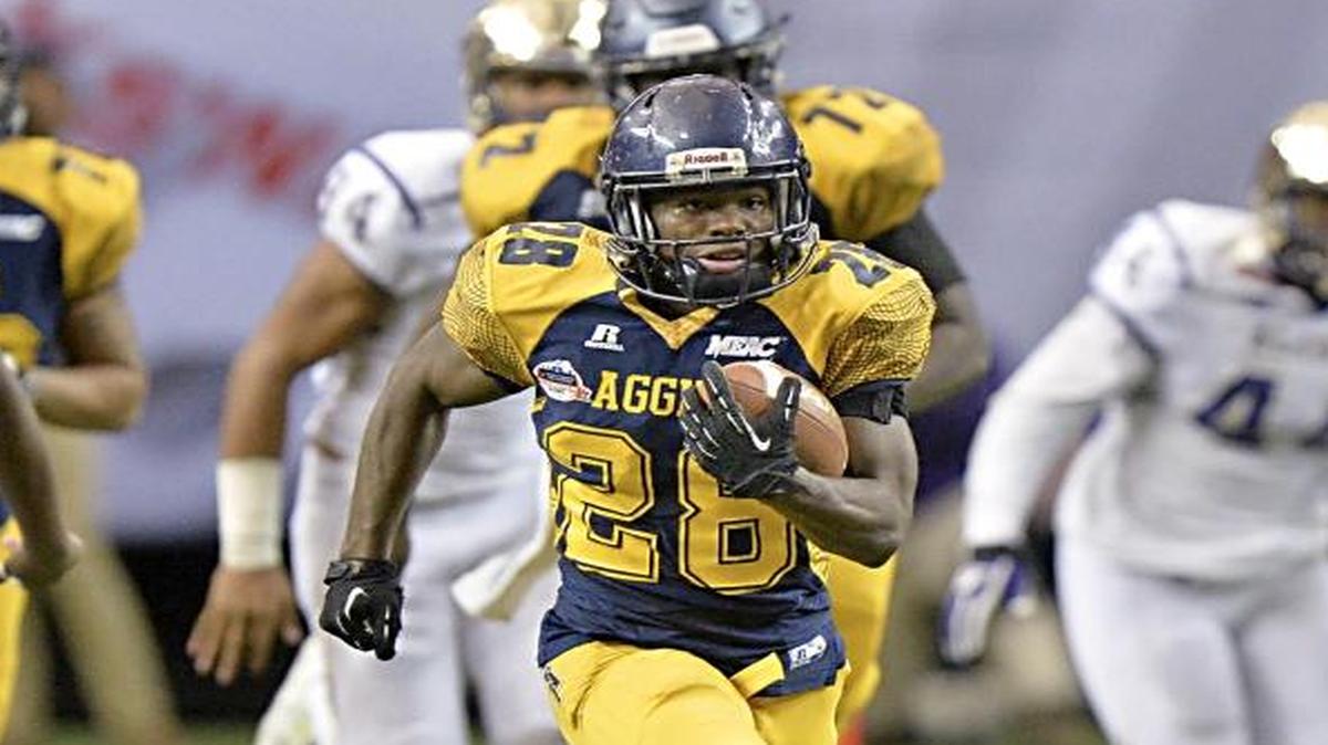 North Carolina A&T running back Tarik Cohen (28) runs for one of his three touchdowns during a 41-34 win against Alcorn State in the Celebration Bowl at the Georgia Dome in Atlanta on Saturday, Dec. 19, 2015. (Hyosub Shin/Atlanta Journal-Constitution/TNS)
