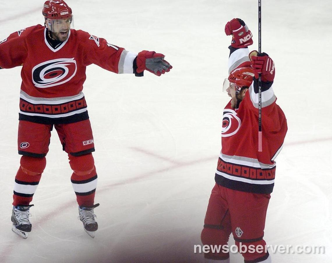 Carolina Hurricanes’ Mark Recchi, left, congratulates Ray Whitney on his first of two goals during Game 2 of the Eastern Conference playoff series between the Carolina Hurricanes and the Buffalo Sabres played at the RBC Center May 22, 2006. The Canes won 4-3 to tie the best of seven series 1-1.