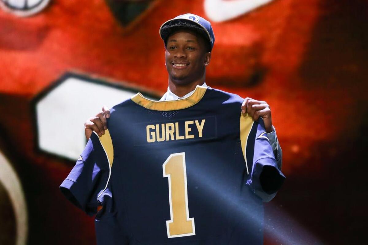Tarboro native Todd Gurley of the Georgia Bulldogs holds up a jersey after being picked No. 10 overall by the St. Louis Rams during the first round of the 2015 NFL Draft.